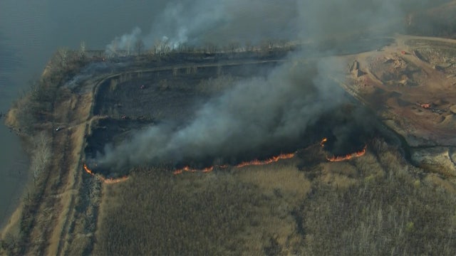 Firefighters battle large brush fire in Gloucester County, no injuries reported