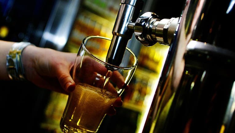 Generic beer pouring, 25 January 2005. AFR Picture by ANDREW QUILTY