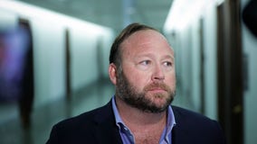 Alex Jones trial postponed as Infowars seeks bankruptcy