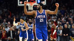 Embiid scores 44 as Sixers beat Cavs to clinch playoff spot