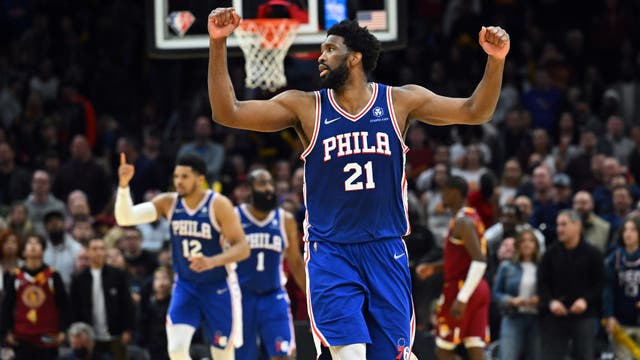 Embiid scores 44 as Sixers beat Cavs to clinch playoff spot