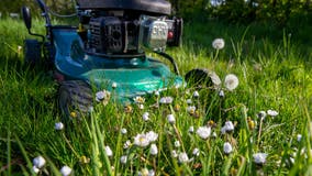 Police: Father backed over 2-year-old son with lawnmower