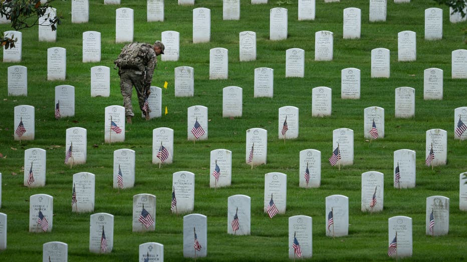 Arlington Cemetery Hosts Annual Flags-In Ceremony Ahead Of Memorial Day Weekend