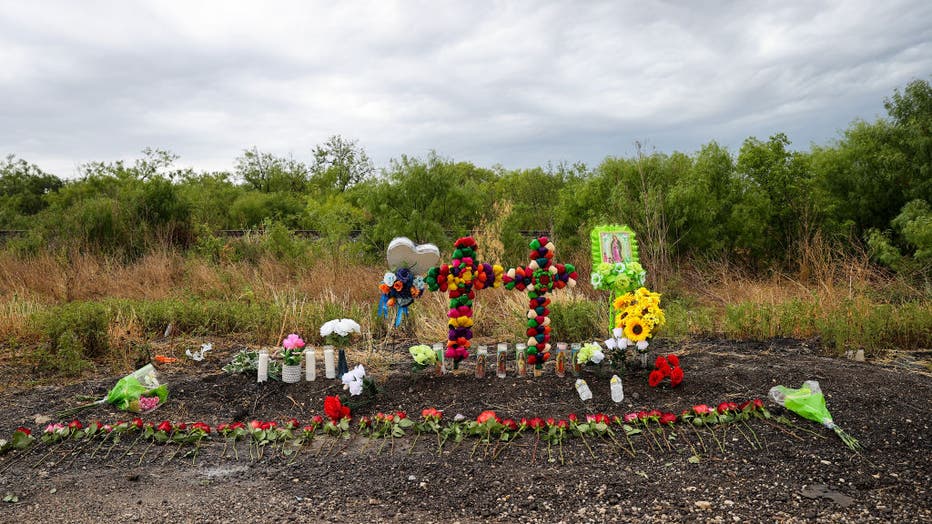 A vigil held after migrants found dead in Texas trailer truck