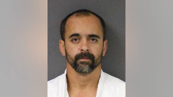 Man charged with murder after woman's burned body found near N.J. cemetery, officials say