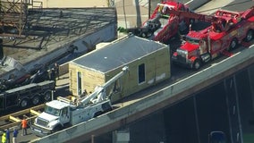 Section of pre-built home slides off flat bed truck on I-95 in Philadelphia