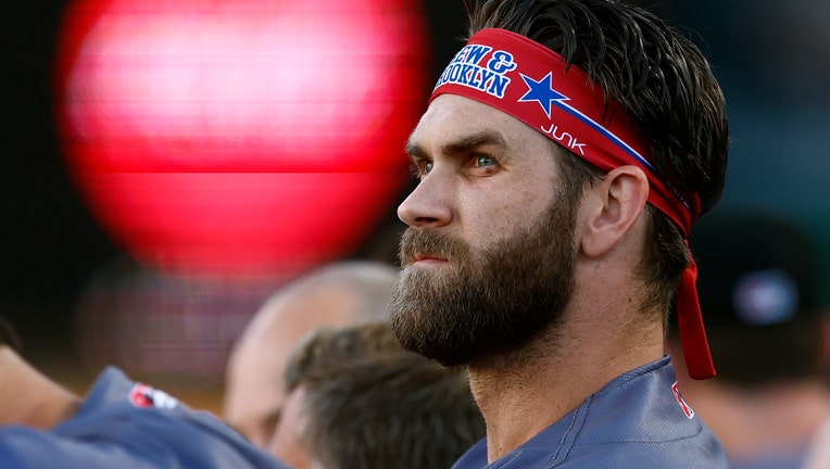 Beard gone, unbridled (and stitched) Bryce Harper plays on