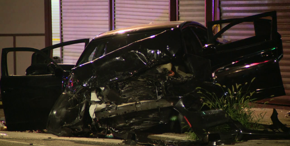 Police: 2 killed, 9 injured after speeding car runs red light, crashes into another car in West Philadelphia