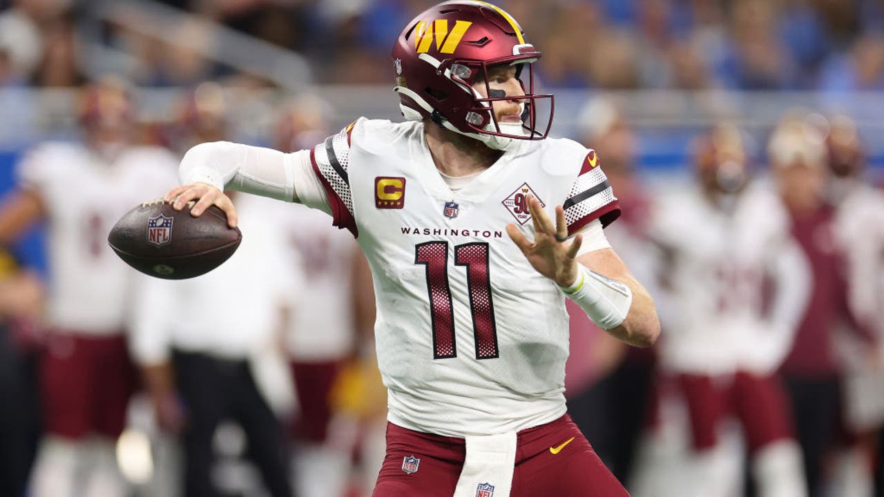 Carson Wentz of the Washington Commanders throws a pass during the News  Photo - Getty Images