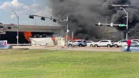 18-wheeler flips over barrier on US-75 overpass in Fairview, driver killed