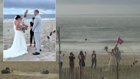 Caught on weather cam: Couple gets married on Cape May beach as severe storms swirl around them