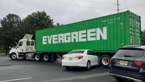 Car with 3 kids inside trapped under tractor-trailer on the way to school in Mercer County