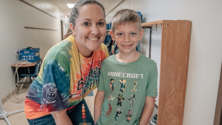 Teacher saves choking student