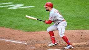 Schwarber, Wheeler lift Phils over Nats 8-1 in rainy game