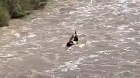 Video shows kayakers taking on swollen river after heavy rainfall in Australia