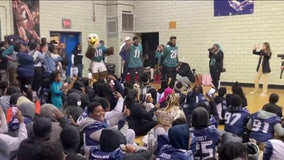 Eagles star players visit West Philadelphia Panthers youth football team and cheerleaders