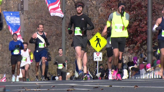 Cold weather tests Philly Marathon runners, while 1 runner is surprised with marriage proposal