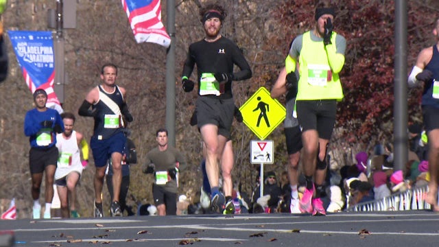Cold weather tests Philly Marathon runners, while 1 runner is surprised with marriage proposal