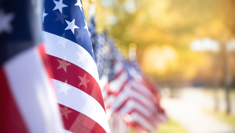 Closeup of an American flag in a row