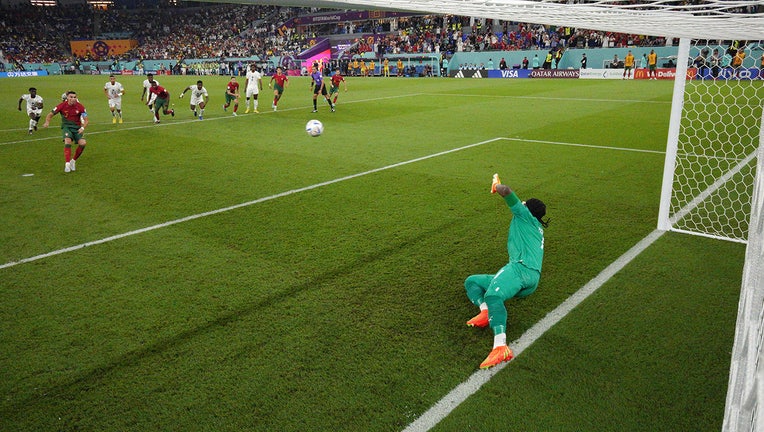 Ronaldo first player to score at 5 World Cups