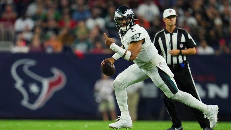 Jalen Hurts, Eagles fend off Commanders in OT to stay undefeated