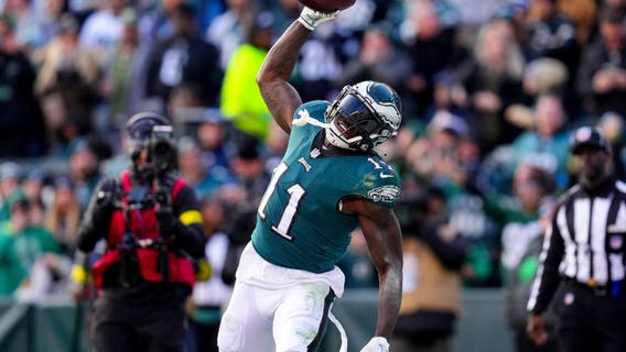 Eagles beat Titans 35-10 as Hurts throws 3 touchdown passes, runs in another one