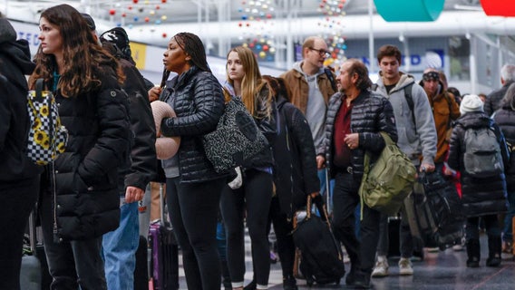 Winter storm adds uncertainty to strong holiday travel demand