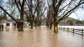 Firefighters rescue mother giving birth in the middle of flooded California riverbed