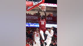 Dunn scores 16, Temple defeats No. 1 Houston 56-55