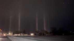Mesmerizing 'light pillars' illuminate the night sky in Minnesota