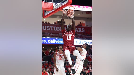 Dunn scores 16, Temple defeats No. 1 Houston 56-55