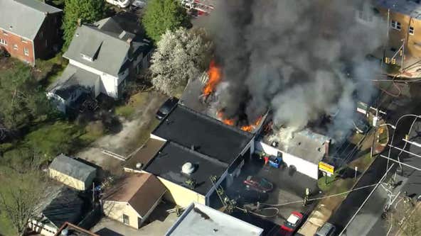 Fire crews respond to 2-alarm fire at auto garage in Upper Darby