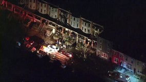 Fire crews fight 4-alarm fire in Reading as blaze spreads to additional homes