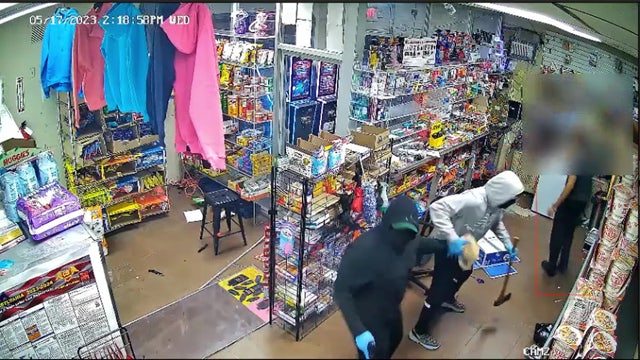 Video: Ax-wielding suspects break into North Philly store during gunpoint robbery