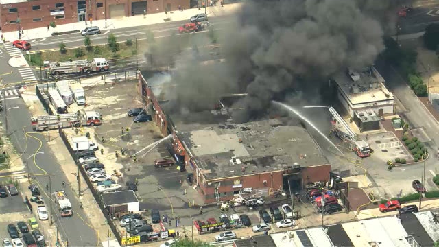 Crews battle large 2-alarm blaze at furniture store in Kensington