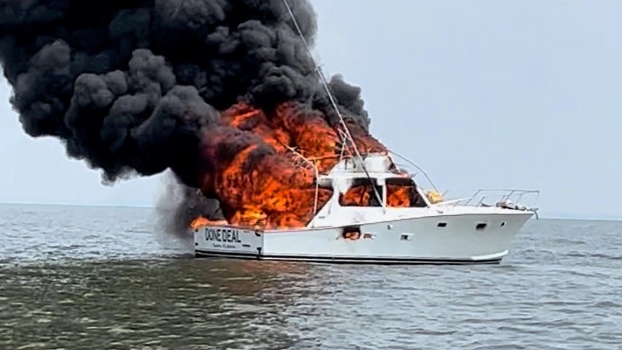 Coast Guard rescues man from water after boat catches fire in Delaware Bay