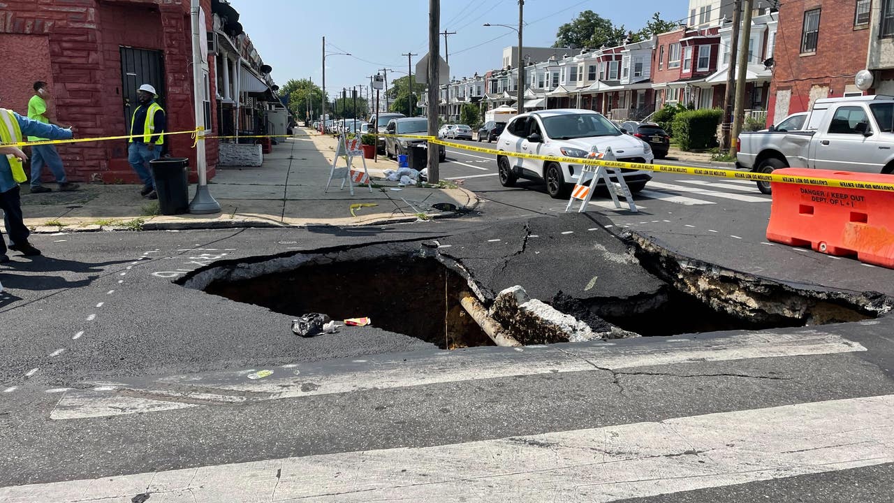 Massive sinkhole opens up in West Philadelphia, shuts down street
