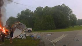 WATCH: Troup County deputy rescues elderly couple from burning car