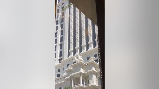 Hostage freed after hourslong standoff at Las Vegas Strip resort room, police say