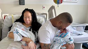 Double delight: Newborn twins share precious birthday with overjoyed parents