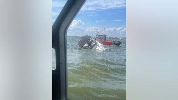 4 people, dog rescued moments before sinking boat capsized in Barnegat Bay: Coast Guard
