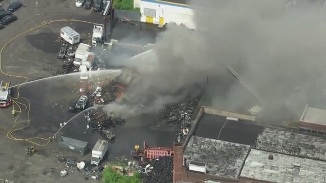 Crews battle fire at junkyard in West Philadelphia