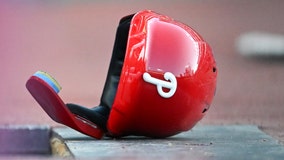 Phillies' Harper flips out on ump, tosses helmet into the stands where it's retrieved by 10-year-old