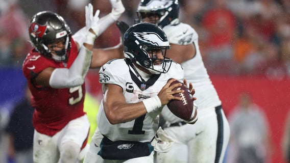 Jalen Hurts throws for TD, runs for another as Eagles thump Buccaneers 25-11 to remain unbeaten
