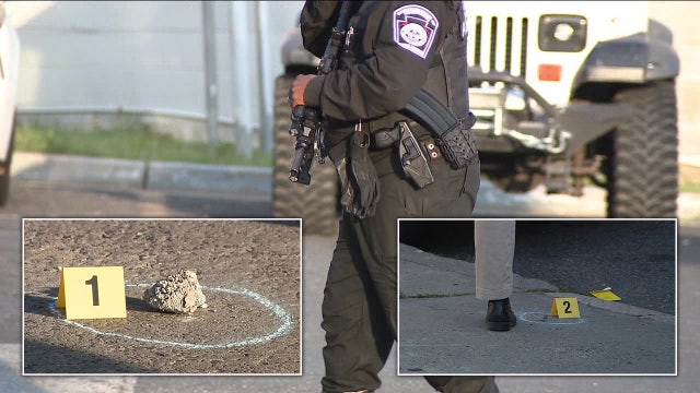 Armed guard at Philly gas station fires at man who threw rock at him during argument: police