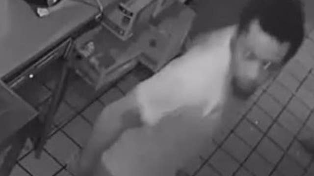 Caught on camera: Man in 'Cold Stone Creamery' shirt burglarizes Burger King using rock