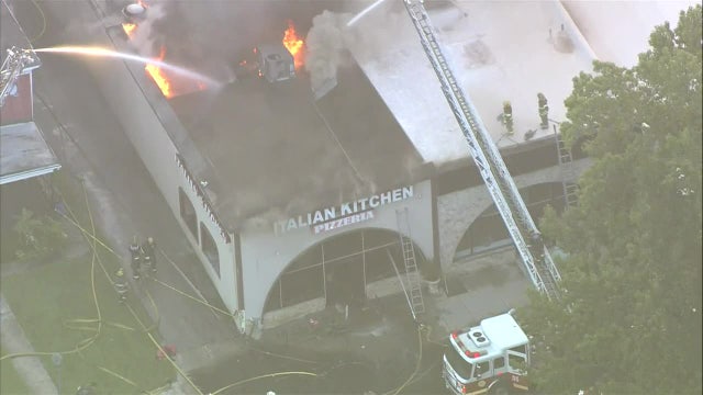 Nearly 70 firefighters battled raging fire inside pizzeria in Philadelphia neighborhood