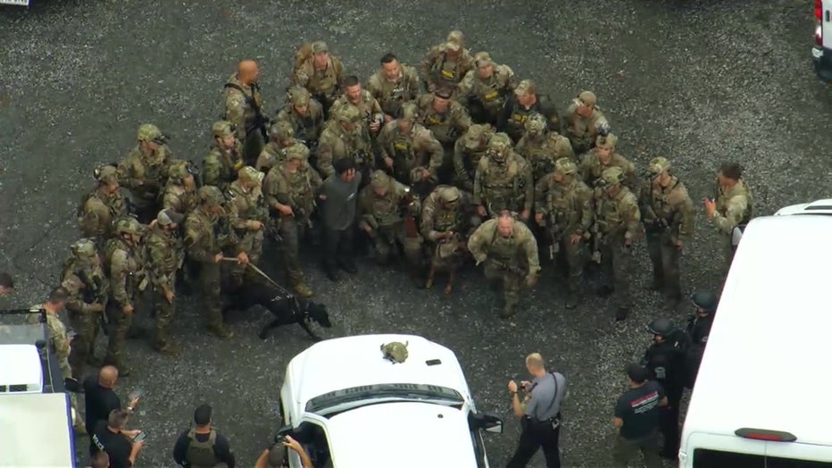 'Proud Of Their Work': Law Enforcement Pose For Photo With Danelo ...