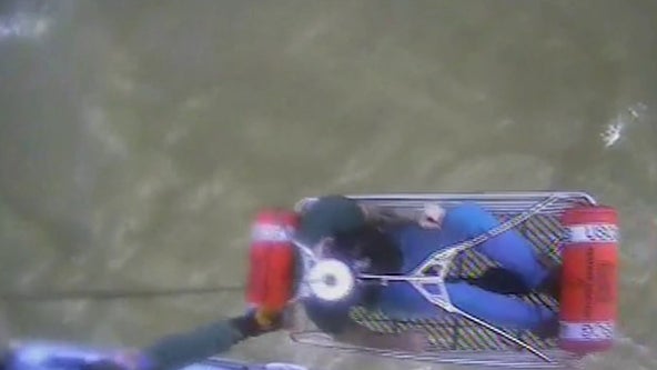 Watch: 3 rescued by U.S. Coast Guard helicopter crew after boat capsizes in Great Bay, NJ