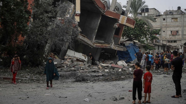 Israel vows complete siege of Gaza as it strikes Palestinian territory after invasion by Hamas